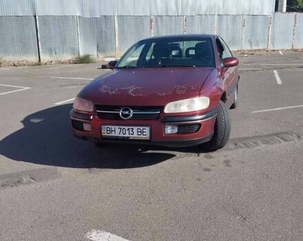 Опель Омега 1996 в Одессе на Automoto.ua Красный Опель Омега, объемом двигателя 2.5 л и пробегом 316 тыс. км за 2500 $, фото 1 на Automoto.ua