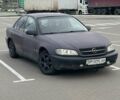 Червоний Опель Омега, об'ємом двигуна 2 л та пробігом 340 тис. км за 1600 $, фото 1 на Automoto.ua
