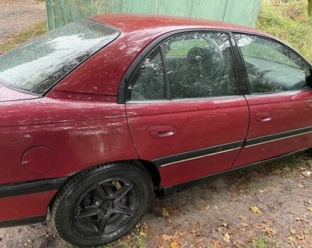 Червоний Опель Омега, об'ємом двигуна 2 л та пробігом 294 тис. км за 1550 $, фото 2 на Automoto.ua