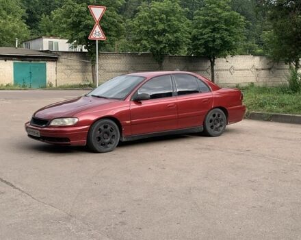 Красный Опель Омега, объемом двигателя 2.5 л и пробегом 380 тыс. км за 3400 $, фото 7 на Automoto.ua