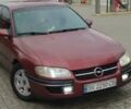 Красный Опель Омега, объемом двигателя 2.5 л и пробегом 500 тыс. км за 600 $, фото 1 на Automoto.ua