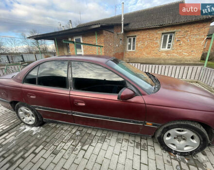 Красный Опель Омега, объемом двигателя 2 л и пробегом 193 тыс. км за 1800 $, фото 1 на Automoto.ua