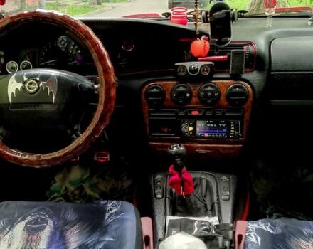 Красный Опель Омега, объемом двигателя 2 л и пробегом 100 тыс. км за 2700 $, фото 6 на Automoto.ua