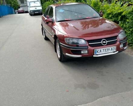 Красный Опель Омега, объемом двигателя 2 л и пробегом 100 тыс. км за 2700 $, фото 1 на Automoto.ua