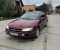 Червоний Опель Омега, об'ємом двигуна 2 л та пробігом 496 тис. км за 1800 $, фото 1 на Automoto.ua