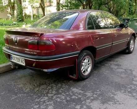 Красный Опель Омега, объемом двигателя 2 л и пробегом 100 тыс. км за 2700 $, фото 7 на Automoto.ua