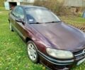 Опель Омега 1997 в Луцке на Automoto.ua Красный Опель Омега, объемом двигателя 2 л и пробегом 334 тыс. км за 2000 $, фото 1 на Automoto.ua