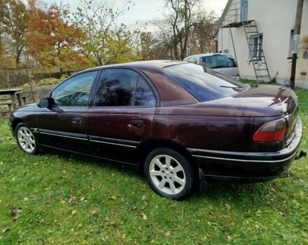 Опель Омега 1997 в Луцке на Automoto.ua Красный Опель Омега, объемом двигателя 2 л и пробегом 334 тыс. км за 2000 $, фото 2 на Automoto.ua