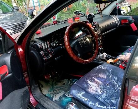 Червоний Опель Омега, об'ємом двигуна 2 л та пробігом 100 тис. км за 3000 $, фото 5 на Automoto.ua