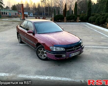 Красный Опель Омега, объемом двигателя 2 л и пробегом 306 тыс. км за 1800 $, фото 2 на Automoto.ua