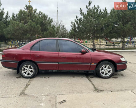 Червоний Опель Омега, об'ємом двигуна 2 л та пробігом 496 тис. км за 1800 $, фото 3 на Automoto.ua