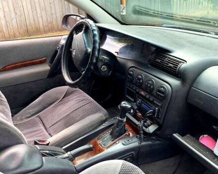 Красный Опель Омега, объемом двигателя 2 л и пробегом 306 тыс. км за 1800 $, фото 1 на Automoto.ua