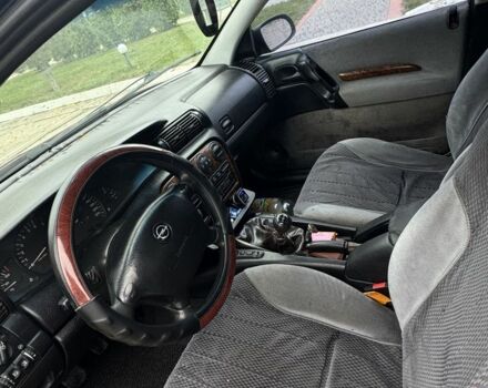 Червоний Опель Омега, об'ємом двигуна 2 л та пробігом 496 тис. км за 1800 $, фото 7 на Automoto.ua