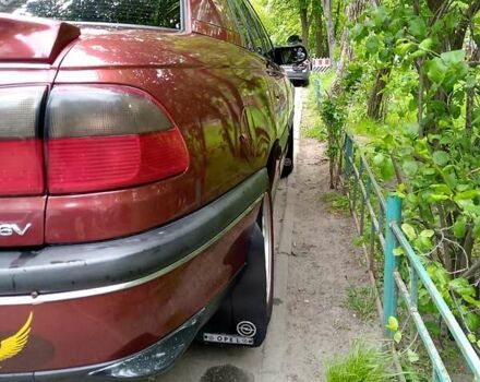 Красный Опель Омега, объемом двигателя 2 л и пробегом 100 тыс. км за 2700 $, фото 5 на Automoto.ua