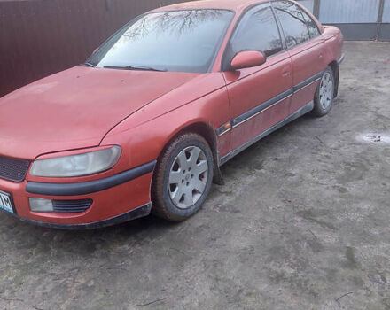 Красный Опель Омега, объемом двигателя 2 л и пробегом 240 тыс. км за 1200 $, фото 9 на Automoto.ua