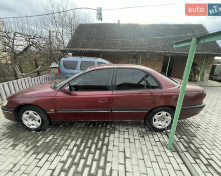 Красный Опель Омега, объемом двигателя 2 л и пробегом 193 тыс. км за 1800 $, фото 2 на Automoto.ua