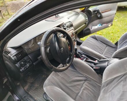 Опель Омега 1997 в Луцке на Automoto.ua Красный Опель Омега, объемом двигателя 2 л и пробегом 334 тыс. км за 2000 $, фото 6 на Automoto.ua