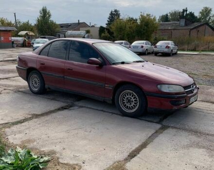 Червоний Опель Омега, об'ємом двигуна 2 л та пробігом 250 тис. км за 1500 $, фото 1 на Automoto.ua