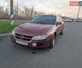 Красный Опель Омега, объемом двигателя 2 л и пробегом 400 тыс. км за 2390 $, фото 9 на Automoto.ua
