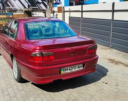 Червоний Опель Омега, об'ємом двигуна 2.5 л та пробігом 344 тис. км за 2800 $, фото 4 на Automoto.ua
