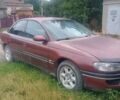 Красный Опель Омега, объемом двигателя 2 л и пробегом 332 тыс. км за 1100 $, фото 1 на Automoto.ua