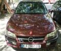 Красный Опель Омега, объемом двигателя 2.5 л и пробегом 252 тыс. км за 3350 $, фото 1 на Automoto.ua