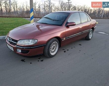 Красный Опель Омега, объемом двигателя 2 л и пробегом 400 тыс. км за 2390 $, фото 12 на Automoto.ua