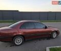 Красный Опель Омега, объемом двигателя 2 л и пробегом 400 тыс. км за 2390 $, фото 4 на Automoto.ua
