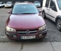 Красный Опель Омега, объемом двигателя 2.5 л и пробегом 252 тыс. км за 3350 $, фото 9 на Automoto.ua