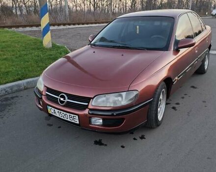 Красный Опель Омега, объемом двигателя 2 л и пробегом 400 тыс. км за 2390 $, фото 11 на Automoto.ua
