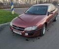 Красный Опель Омега, объемом двигателя 2 л и пробегом 400 тыс. км за 2390 $, фото 11 на Automoto.ua