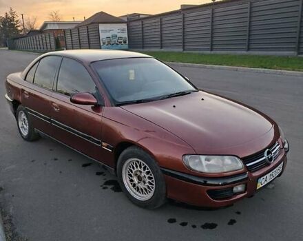 Красный Опель Омега, объемом двигателя 2 л и пробегом 400 тыс. км за 2390 $, фото 3 на Automoto.ua