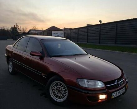 Красный Опель Омега, объемом двигателя 2 л и пробегом 400 тыс. км за 2390 $, фото 2 на Automoto.ua