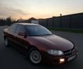 Красный Опель Омега, объемом двигателя 2 л и пробегом 400 тыс. км за 2390 $, фото 2 на Automoto.ua