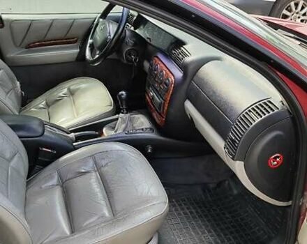 Червоний Опель Омега, об'ємом двигуна 2.5 л та пробігом 344 тис. км за 2800 $, фото 9 на Automoto.ua