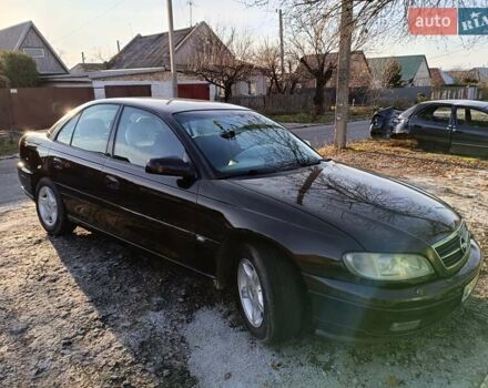 Красный Опель Омега, объемом двигателя 2.2 л и пробегом 222 тыс. км за 3500 $, фото 7 на Automoto.ua