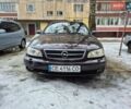 Красный Опель Омега, объемом двигателя 2.2 л и пробегом 350 тыс. км за 2000 $, фото 1 на Automoto.ua