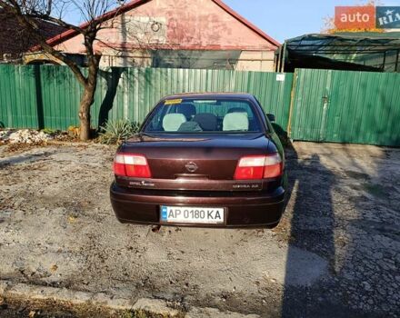 Красный Опель Омега, объемом двигателя 2.2 л и пробегом 222 тыс. км за 3500 $, фото 5 на Automoto.ua