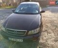 Красный Опель Омега, объемом двигателя 2.2 л и пробегом 222 тыс. км за 3500 $, фото 1 на Automoto.ua