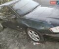 Красный Опель Омега, объемом двигателя 2.2 л и пробегом 401 тыс. км за 3500 $, фото 6 на Automoto.ua