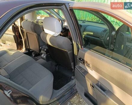 Красный Опель Омега, объемом двигателя 2.2 л и пробегом 222 тыс. км за 3500 $, фото 8 на Automoto.ua