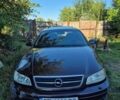 Красный Опель Омега, объемом двигателя 2.2 л и пробегом 350 тыс. км за 1600 $, фото 1 на Automoto.ua