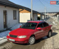 Красный Опель Омега, объемом двигателя 2.2 л и пробегом 290 тыс. км за 1850 $, фото 1 на Automoto.ua
