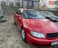 Красный Опель Омега, объемом двигателя 2.2 л и пробегом 320 тыс. км за 2400 $, фото 1 на Automoto.ua