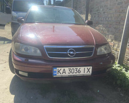 Красный Опель Омега, объемом двигателя 2.6 л и пробегом 330 тыс. км за 1700 $, фото 10 на Automoto.ua