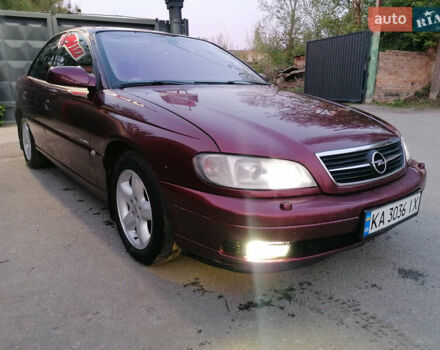 Красный Опель Омега, объемом двигателя 2.6 л и пробегом 330 тыс. км за 1700 $, фото 14 на Automoto.ua