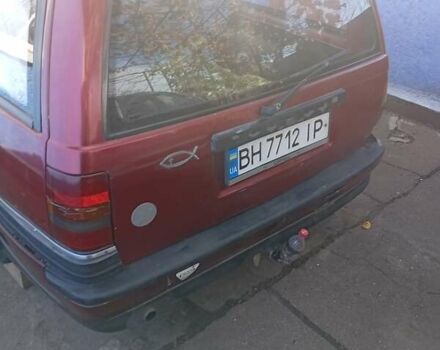 Красный Опель Омега, объемом двигателя 2 л и пробегом 400 тыс. км за 1300 $, фото 1 на Automoto.ua