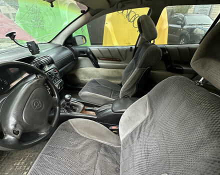 Червоний Опель Омега, об'ємом двигуна 2 л та пробігом 401 тис. км за 950 $, фото 6 на Automoto.ua