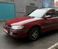 Червоний Опель Омега, об'ємом двигуна 2 л та пробігом 321 тис. км за 3000 $, фото 1 на Automoto.ua