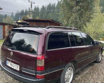 Красный Опель Омега, объемом двигателя 2 л и пробегом 250 тыс. км за 1200 $, фото 6 на Automoto.ua
